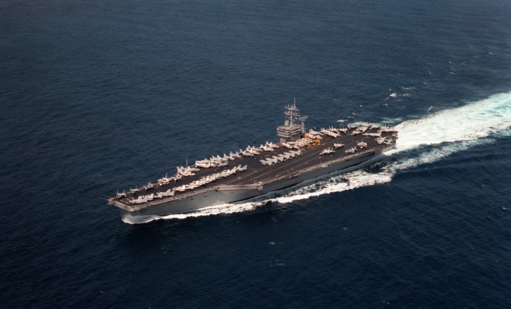 An Aerial Port Bow View Of The Nuclear Powered Aircraft Carrier Uss