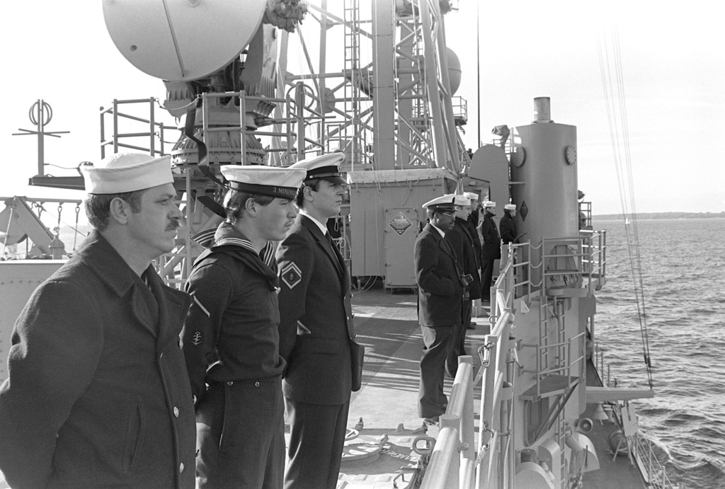 United States And German Sailors Man The Rail Aboard The Guided Missile