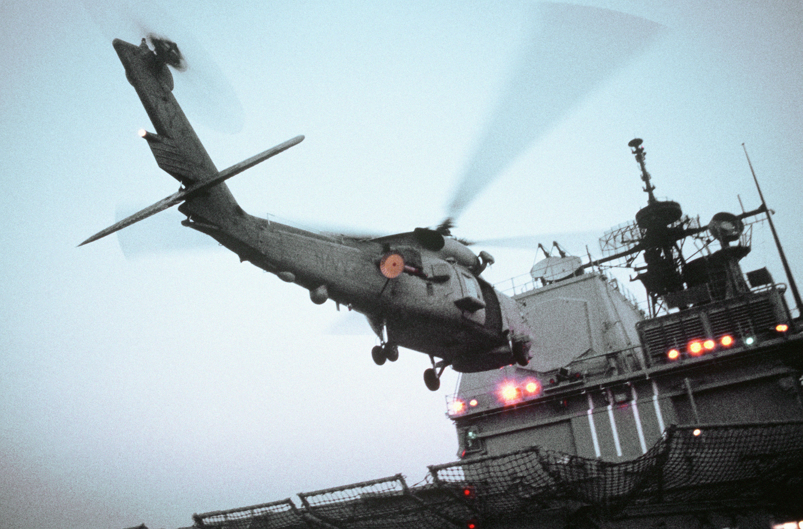 An SH 60B Sea Hawk Helicopter Prepares To Land On The Helicopter Deck