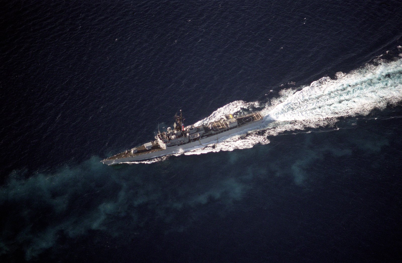 An Aerial Port Bow View Of The Guided Missile Frigate USS RAMSEY FFG 2