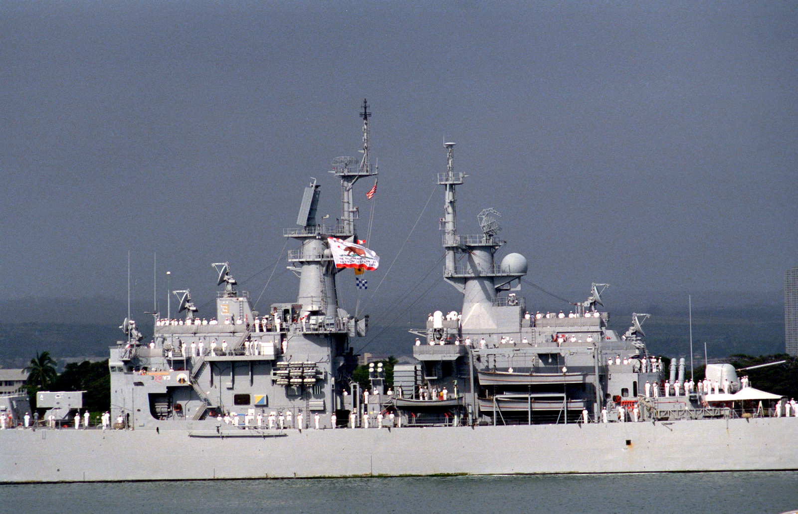 Sailors Man The Rails Aboard The Nuclear Powered Guided Missile Cruiser