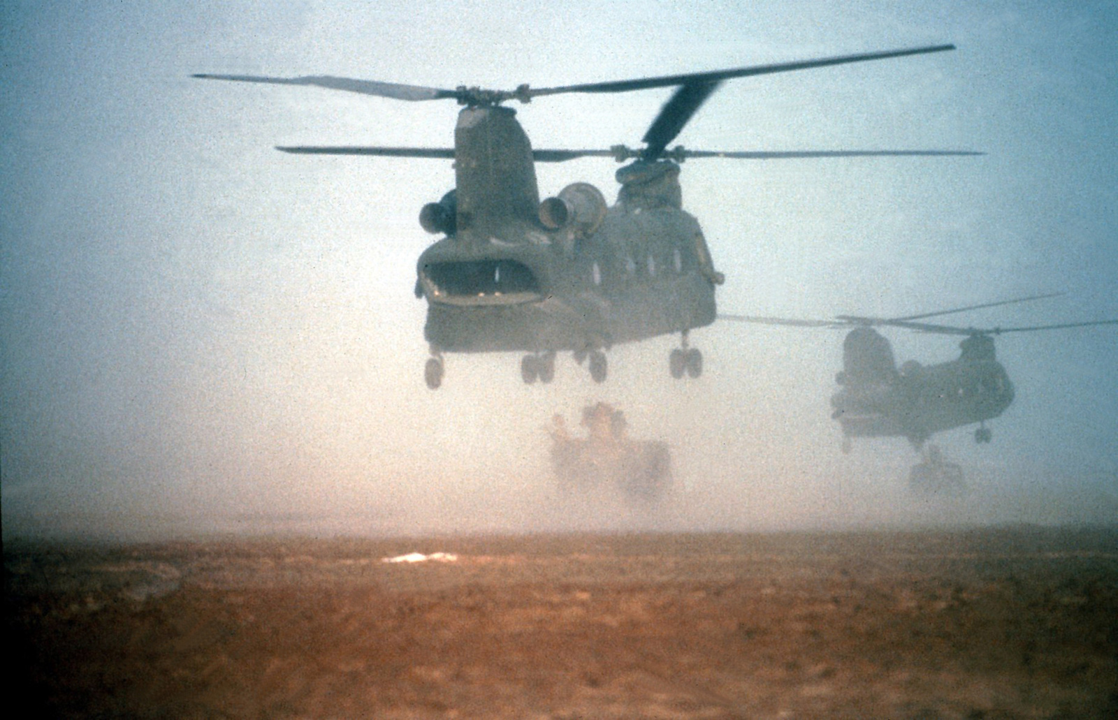 U S Army Ch Chinook Helicopters Takeoff On A Mission During