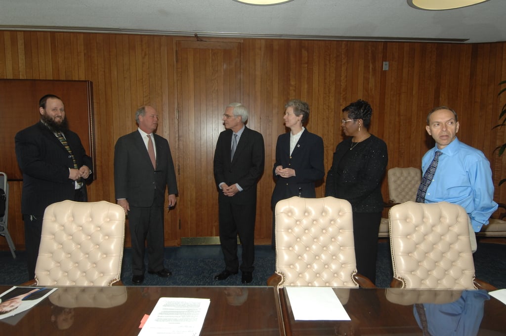 Signing Of Settlement For Fair Labor Standards Act Claim Signing Of