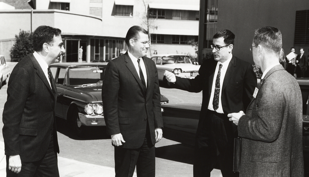 President John F. Kennedy 's visit to Lawrence Radiation Laboratory. From left: Edward Teller, Associate Director; Robert McNamara, Defense Secretary; and Harold Brown, Director of Defense Research and Engineering in discussion outside