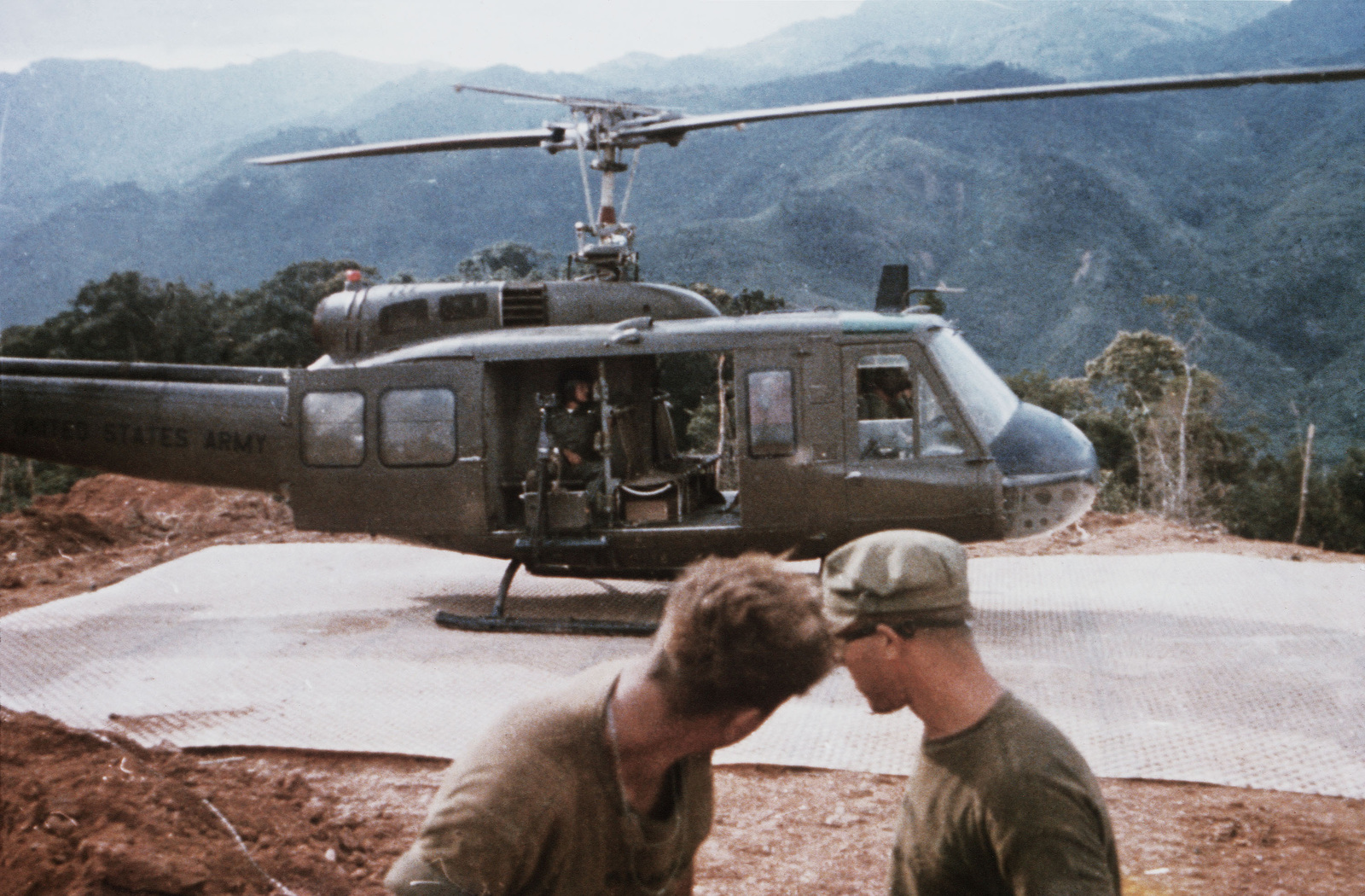 A Uh 1 Iroquois Helicopter Rests On A Recently Installed Landing