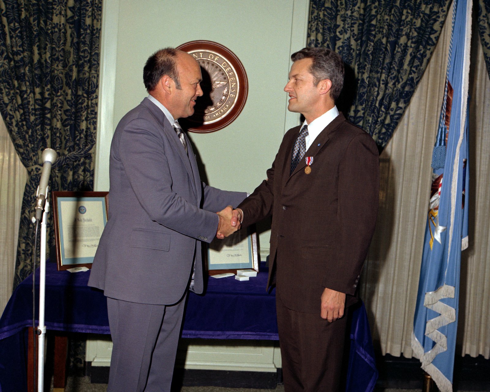 Secretary Of Defense Melvin R. Laird, Left, Congratulates Assistant ...