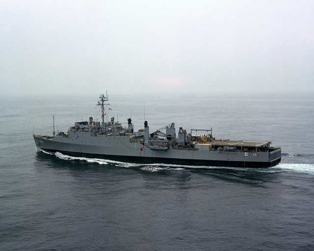 A port view of the amphibious transport dock USS PLYMOUTH ROCK (LSD 29 ...