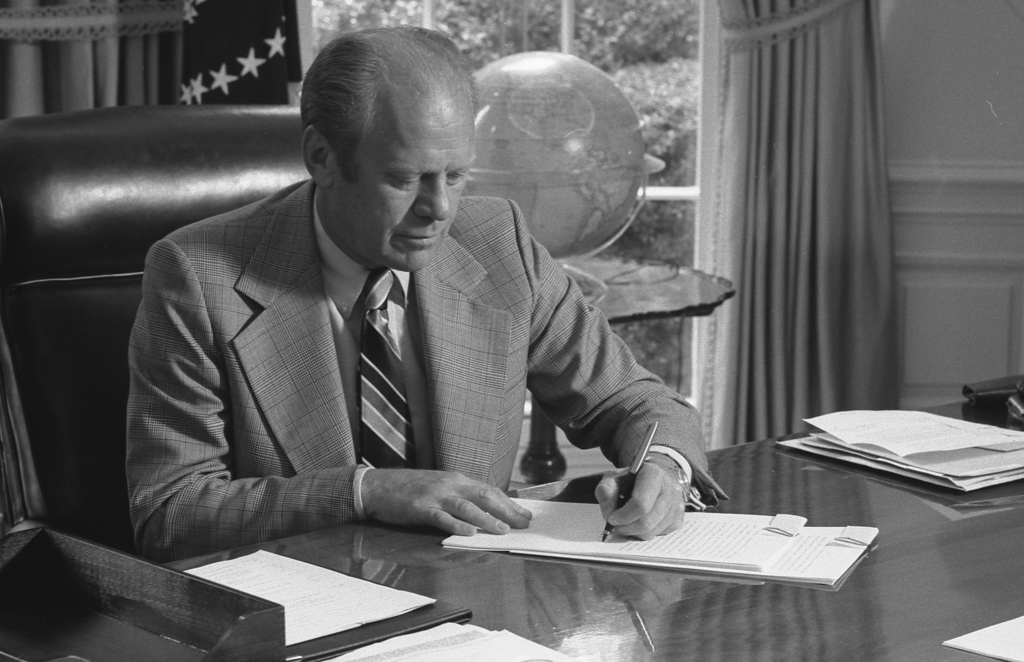Photograph of President Gerald R. Ford Signing His Crime Message to