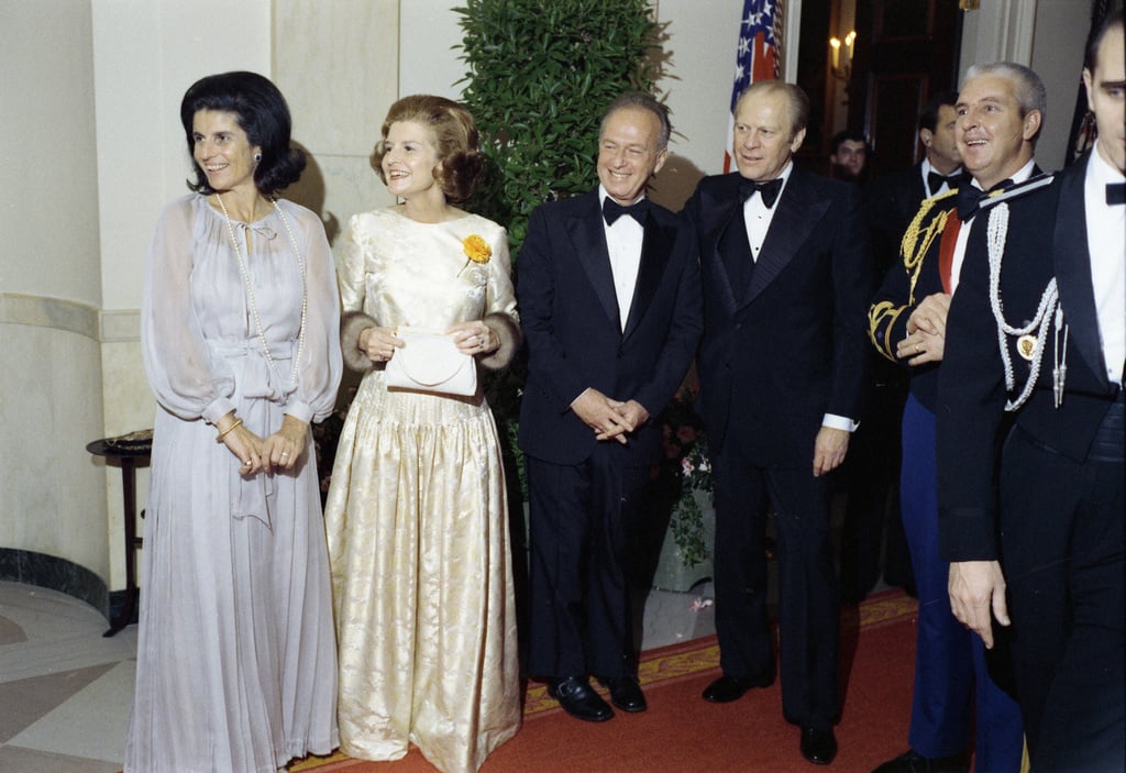 Photograph of President Gerald R. Ford, First Lady Betty Ford, and Prime  Minister and Mrs. Yitzhak Rabin of Israel Standing in Cross Hall after They  Finished Receiving After-Dinner Guests at a State