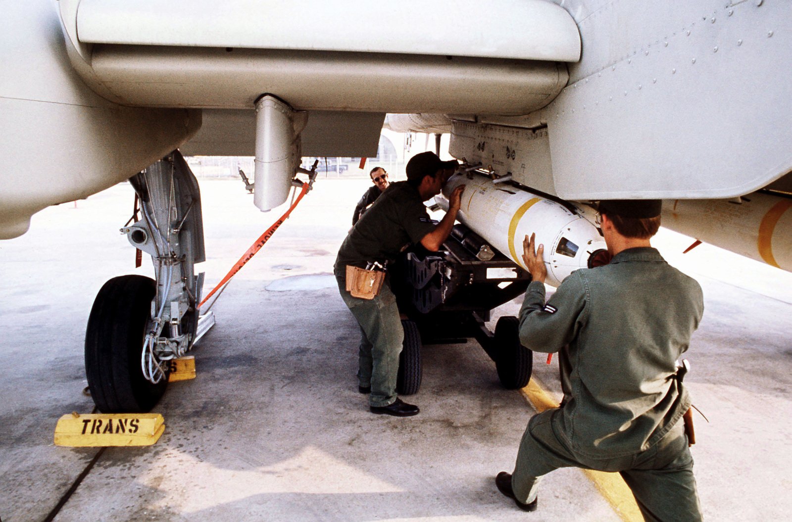 Ground Crewman Attach A Live Mark 20 Anti-tank Cluster Bomb To The Wing 