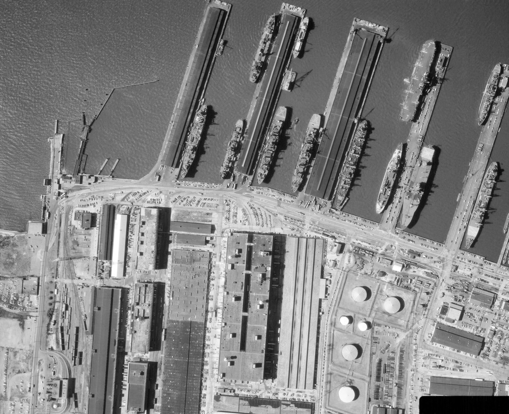 An Aerial View Of Various Us Navy Ships Tied Up At Piers Beside The Naval Supply Center Picryl