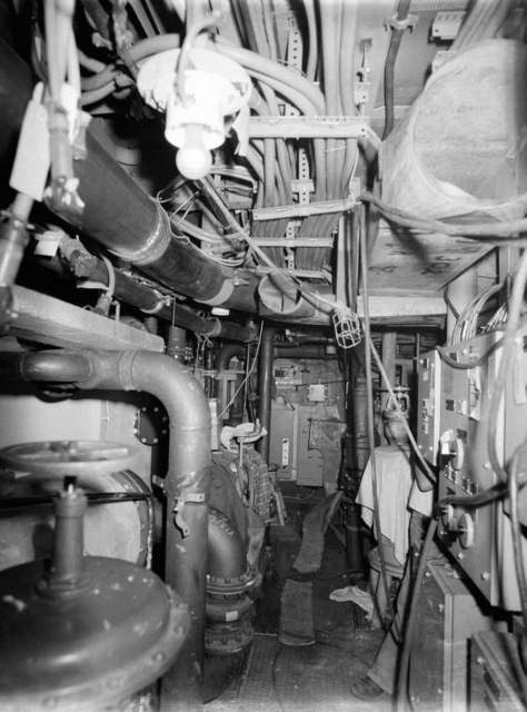 An interior view of auxiliary machine room No. 3 on the guided missile ...