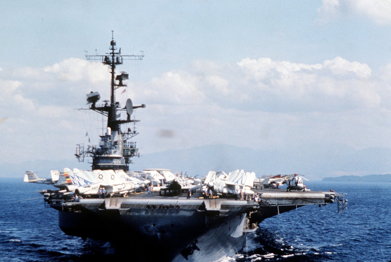 A bow-on view of the aircraft carrier USS MIDWAY (CV 41) underway off ...