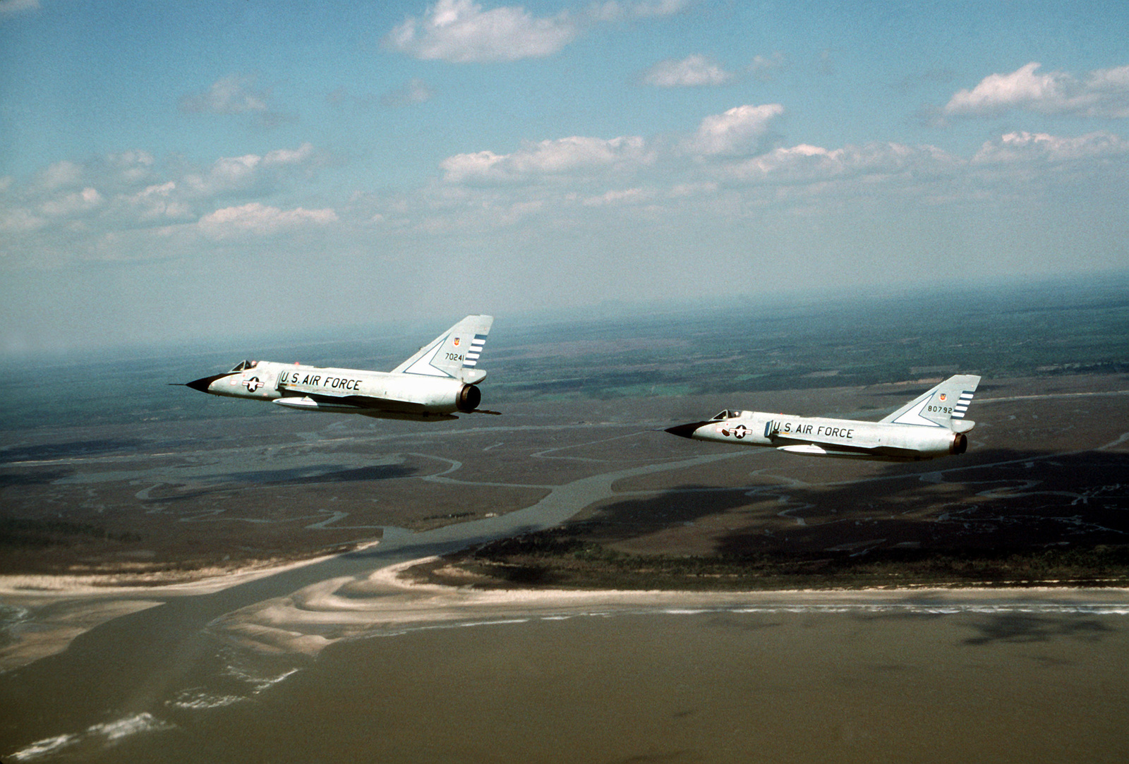 An Air To Air Left Side View Of Two F 106 Delta Dart Aircraft Over The Coast Of South Carolina The Aircraft Are Assigned To The 48th Fighter Interceptor Squadron U S National Archives