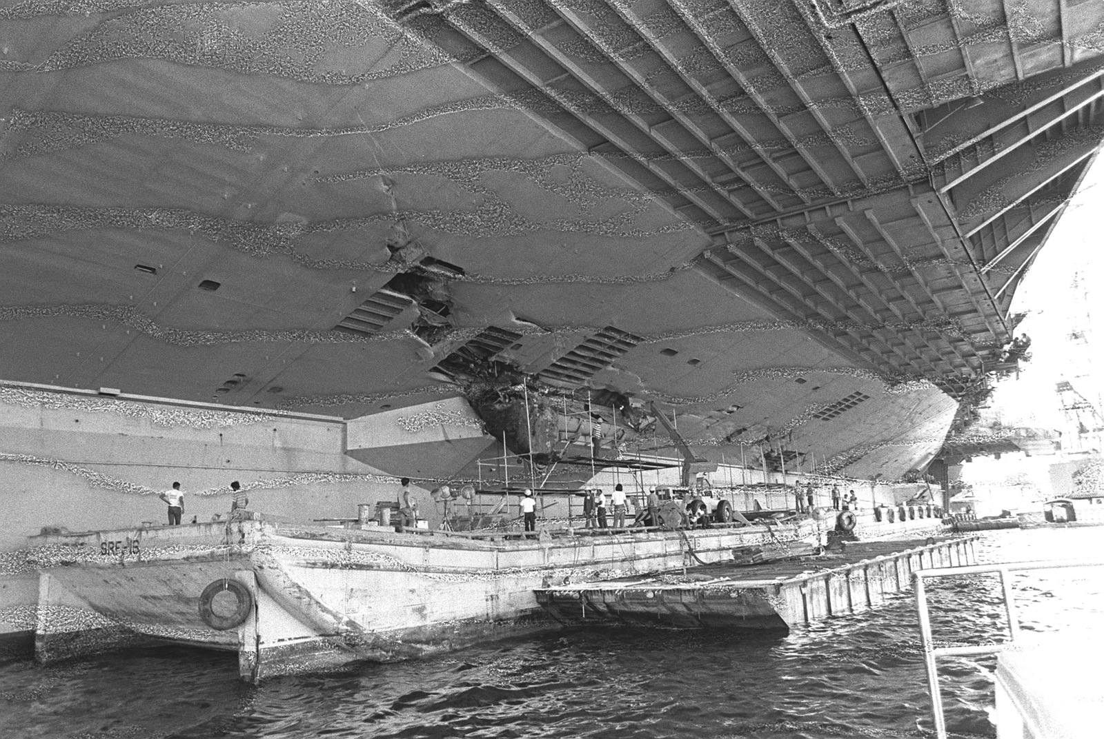 a-view-of-damage-caused-to-the-port-amidships-section-of-the-aircraft