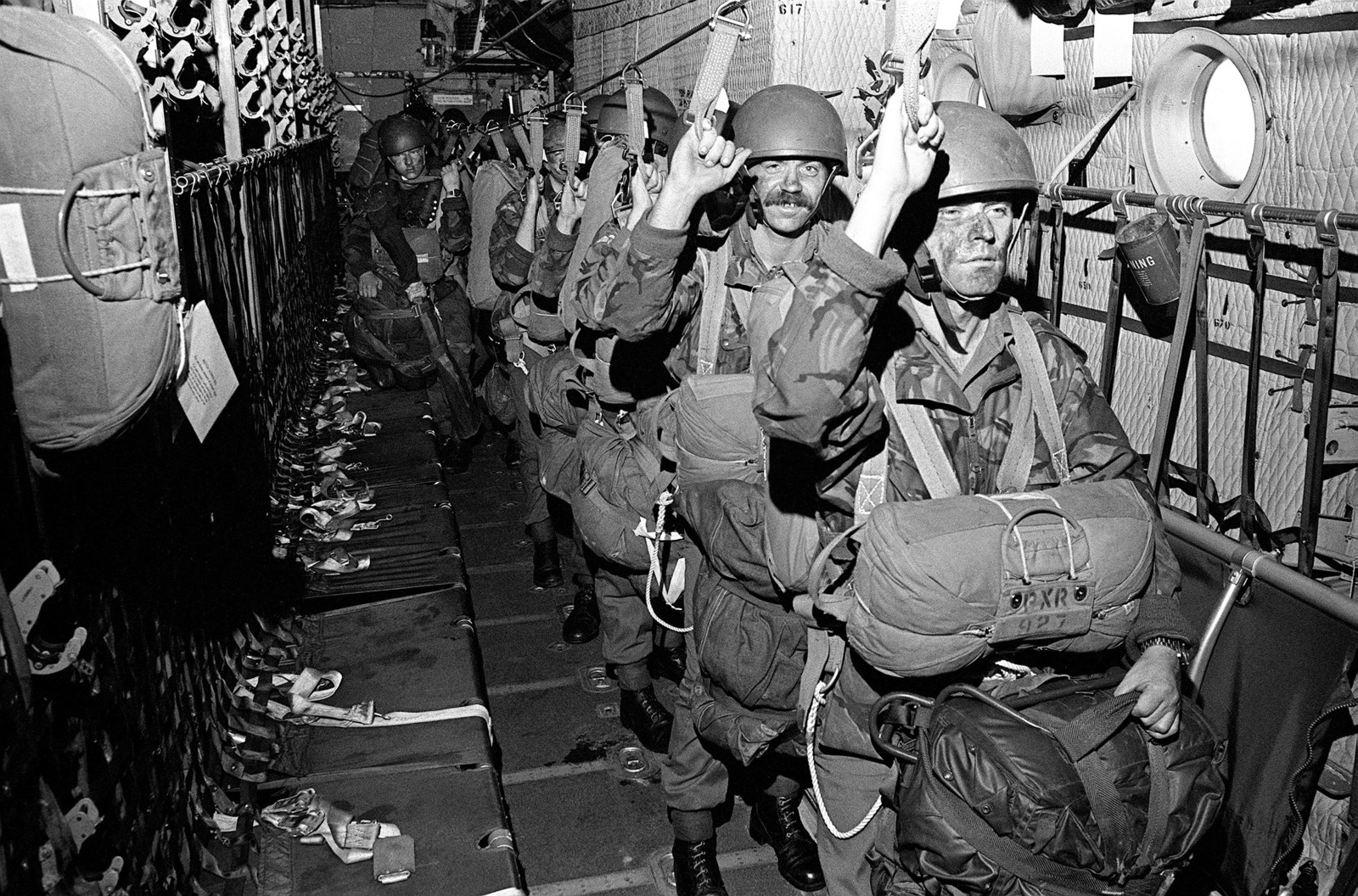 British paratroopers prepare to jump from an in-flight aircraft during  exercise Reforger/Autumn Forge '80. Autumn Forge is a reserve airdrop  involving mostly U.S. and British troops and equipment - NARA & DVIDS