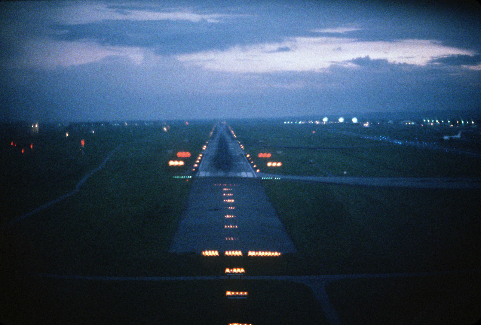 alternating red and white runway lights