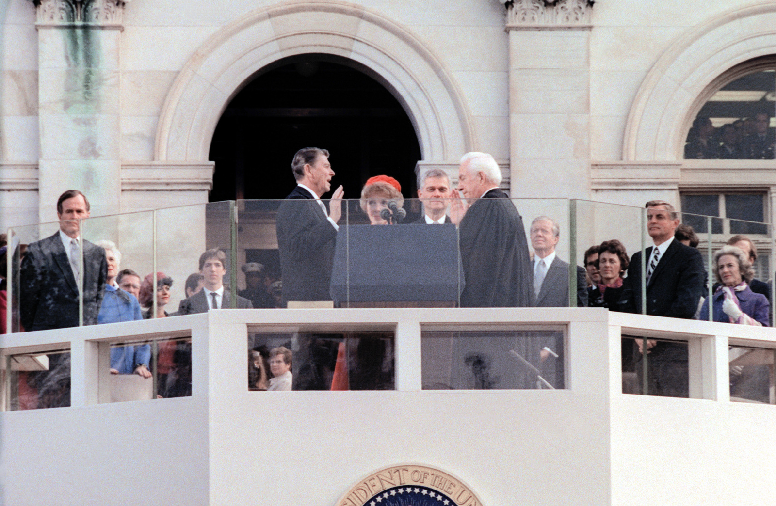 Ronald Reagan Takes The Oath Of Office As The 40th President Of The United States His Wife Nancy Is Standing To His Left During The Inauguration Day Celebration U S National Archives