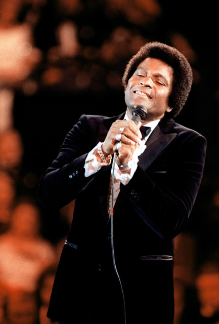 The popular country/western singer Charlie Pride sings to the honored guests during the gala ...