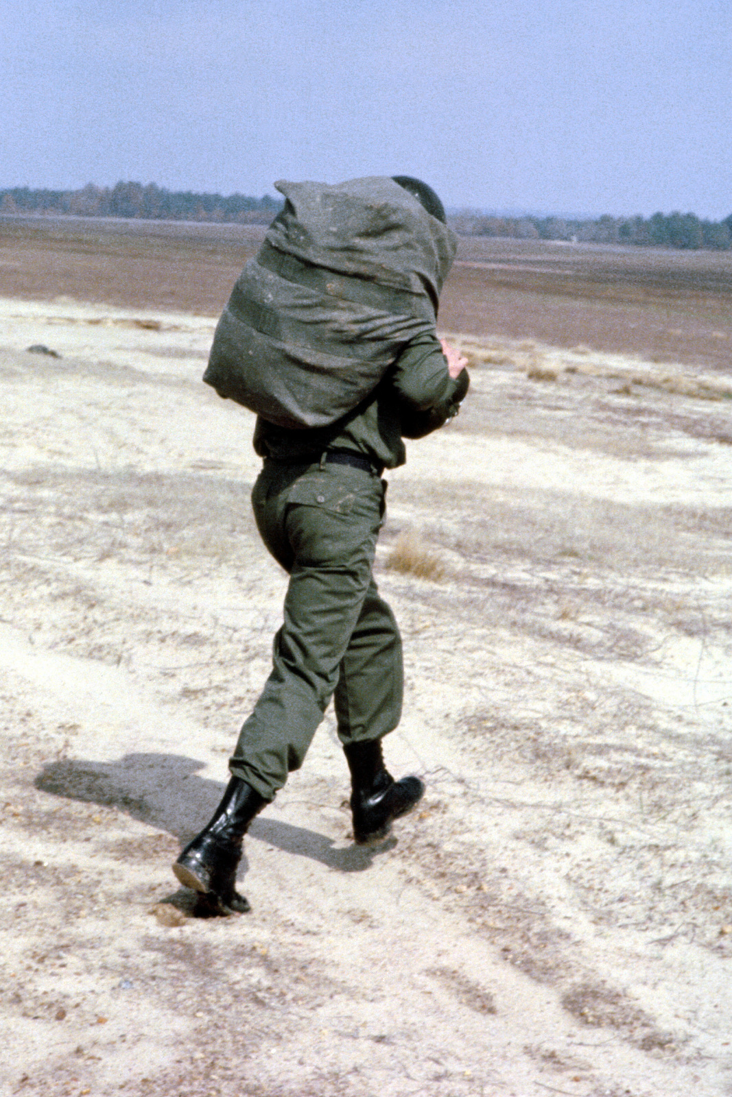 An Air Force Reserve flight surgeon leaves a drop zone at the Ladson ...