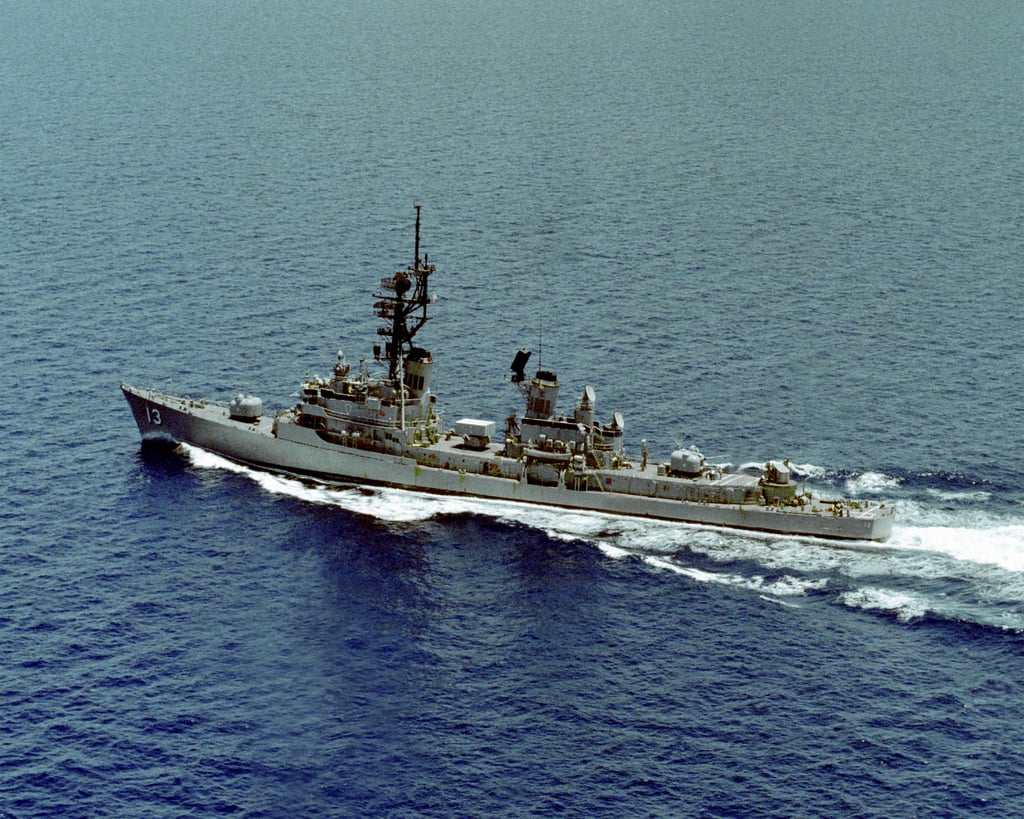 A port view of the guided missile destroyer USS HOEL (DDG-13) underway ...