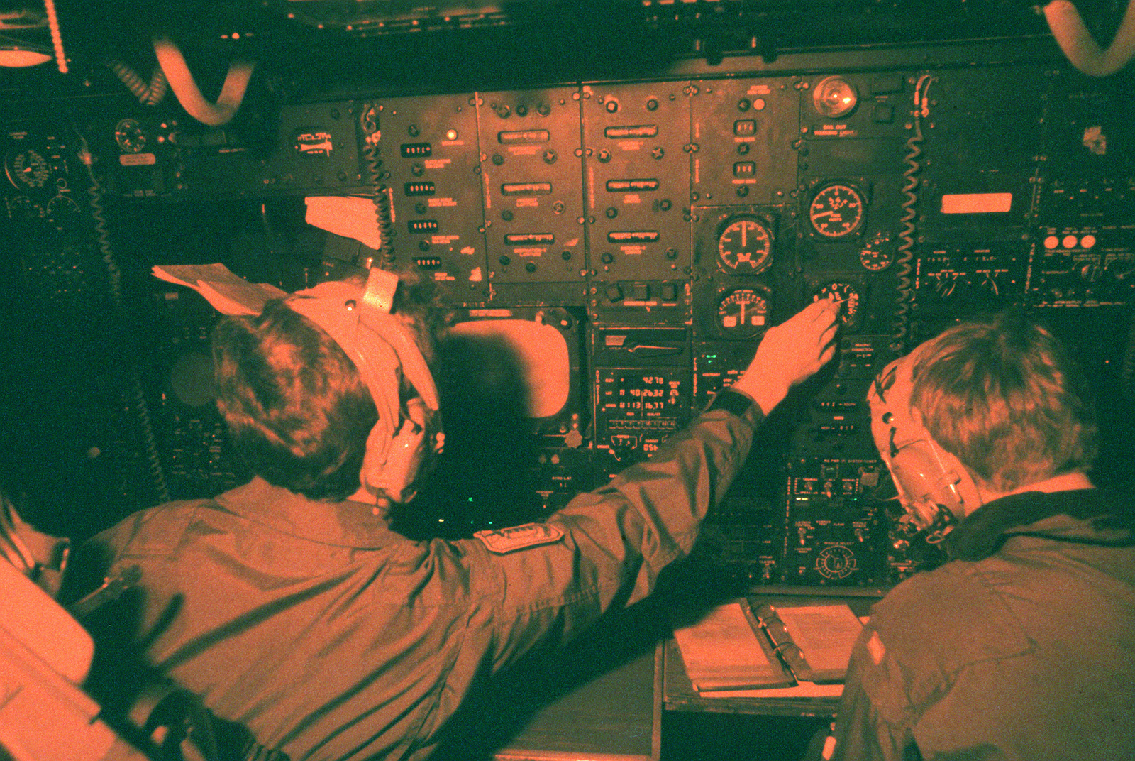 Navigators work in their station aboard a B-52H Stratofortress aircraft ...