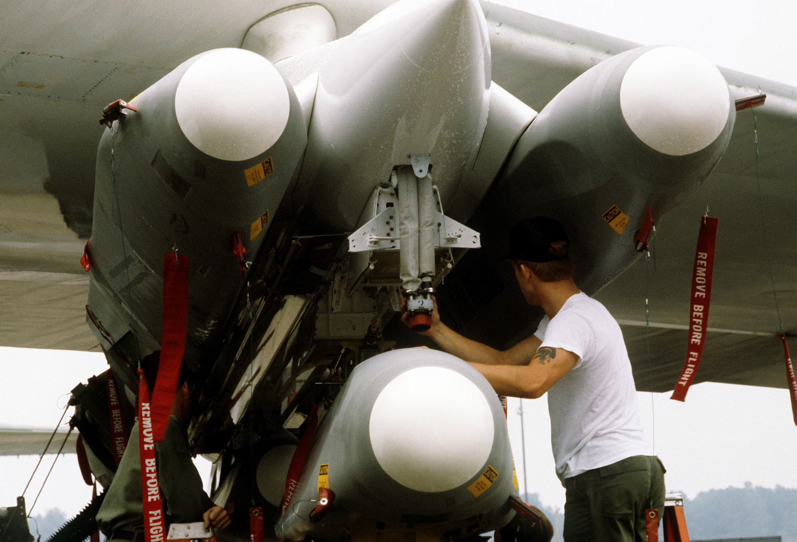 A Missile Crewman From The 416th Bomb Wing, Inspects Three Air-Launched ...