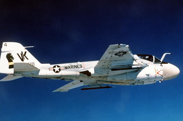 A right side view of a Marine A-6 Intruder aircraft, equipped with part ...