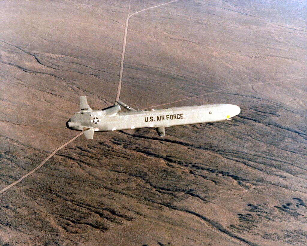 An air-to-air right side view of an air-launched cruise missile (ALCM ...