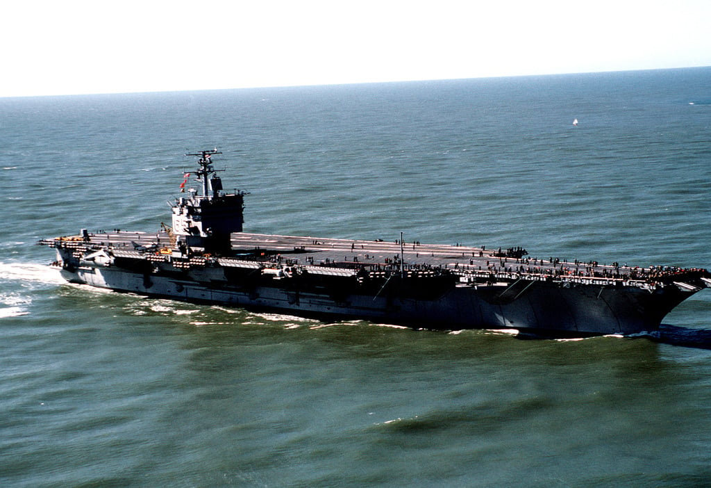 A starboard view of the nuclear-powered aircraft carrier USS ENTERPRISE ...