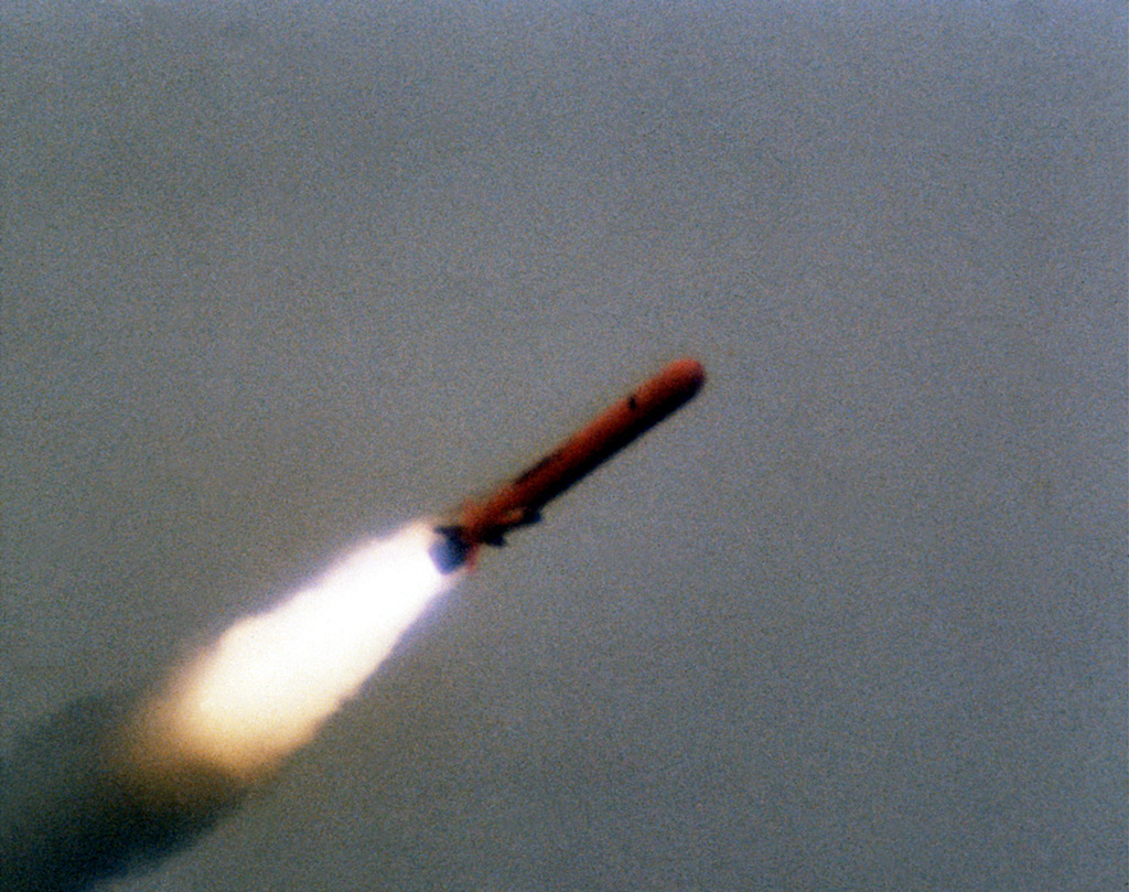 A view of a BGM-109 Tomahawk missile in flight during a land attack ...