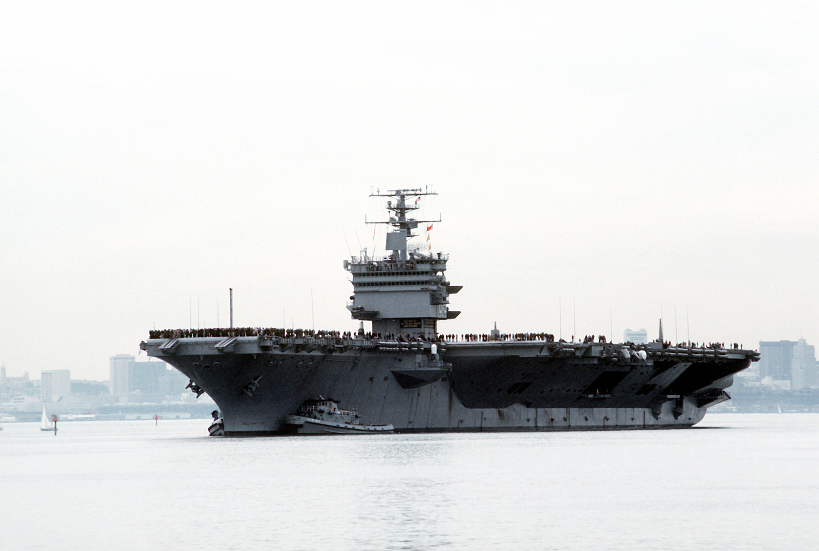 Port bow view of the nuclear-powered aircraft carrier USS ENTERPRISE ...