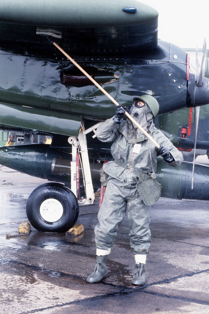 a-ground-crewman-decontaminates-an-ov-10-bronco-aircraft-after-it-had-flown-3adac2-1024.jpg