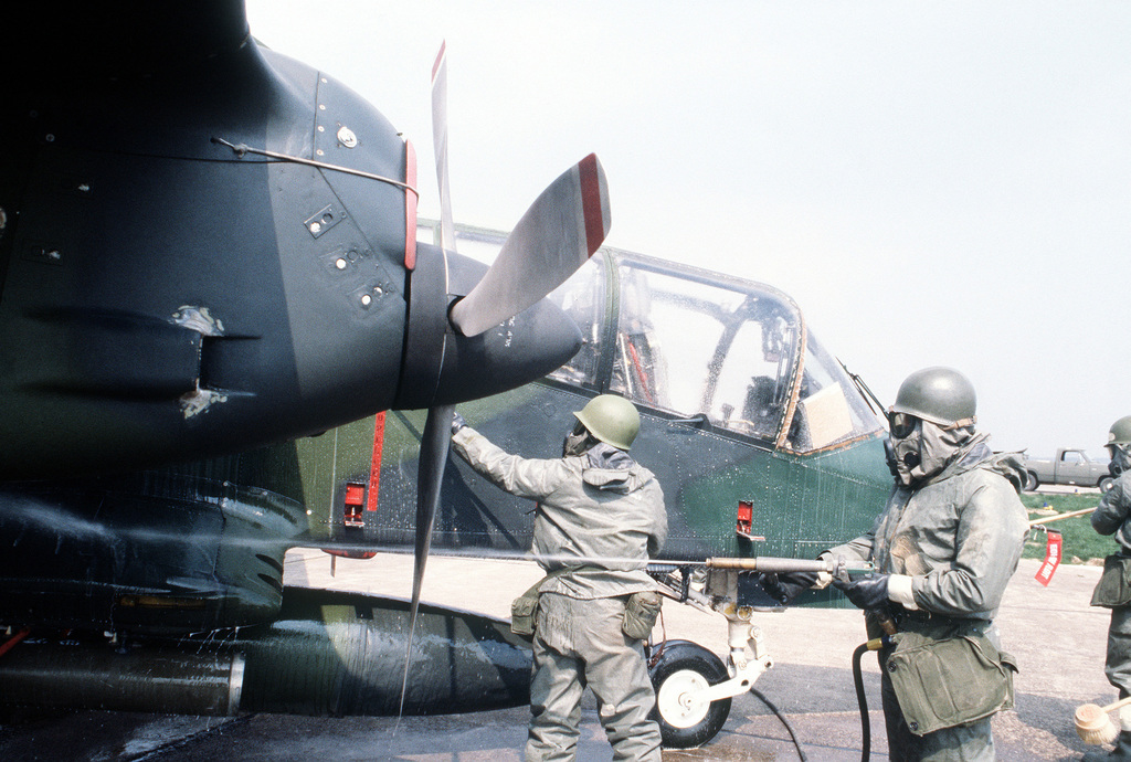 ground-crewmen-decontaminate-an-ov-10-bronco-aircraft-after-it-had-flown-through-8c41b2-1024.jpg