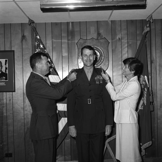 MGEN L. F. Sullivan, left, promotes COL J. E. Cassity to the rank of ...