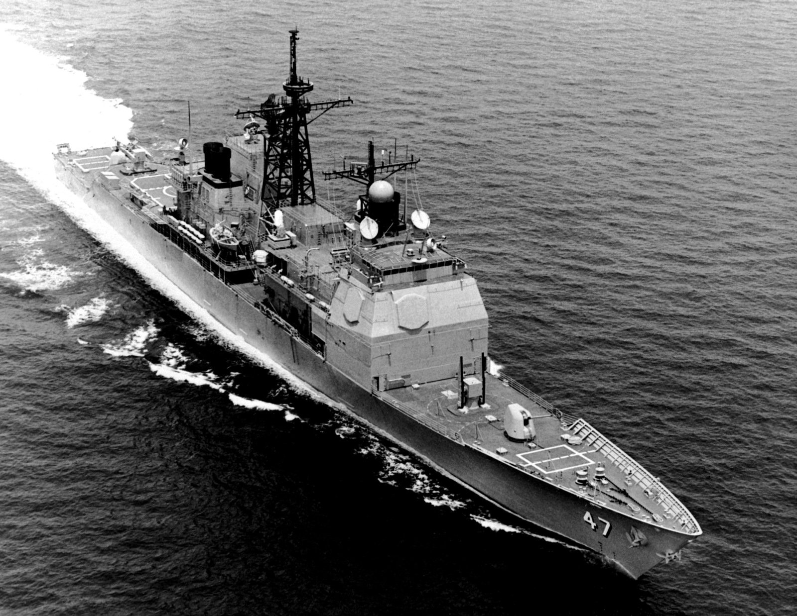 An aerial starboard bow view of the Aegis guided missile cruiser ...