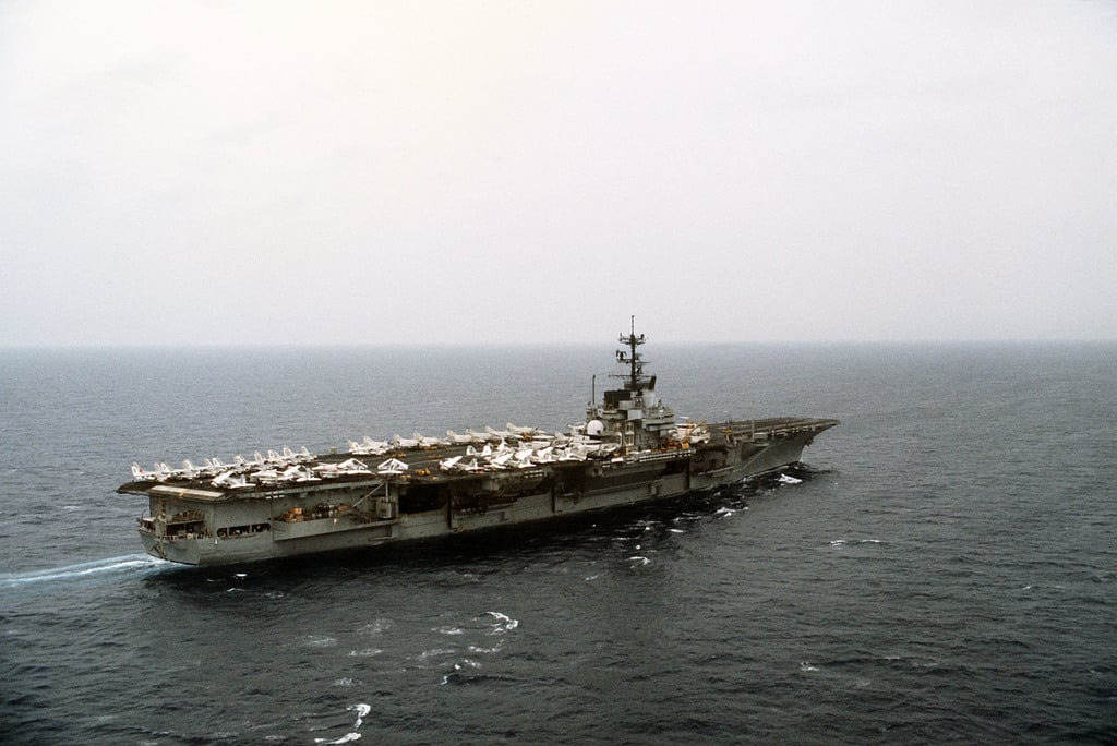 An aerial starboard quarter view of the aircraft carrier USS FORRESTAL ...