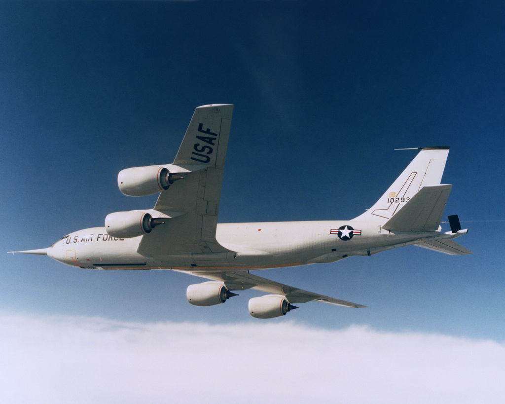 An air-to-air left side view of a re-engined KC-135R Stratotanker ...