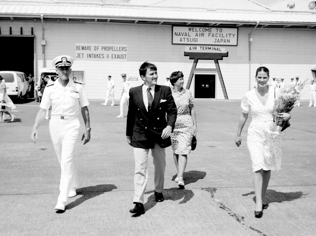 Secretary Of The Navy John F. Lehman Jr. And His Wife Walk Onto The ...