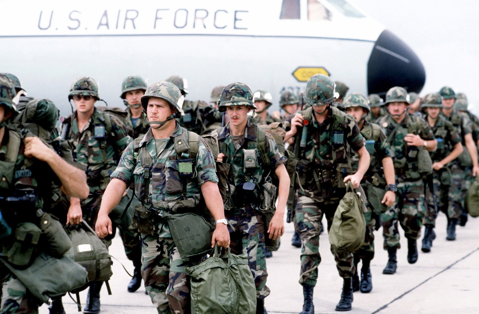 Members Of The 1ST Battalion, 4th Cavalry, March From A C-141B ...