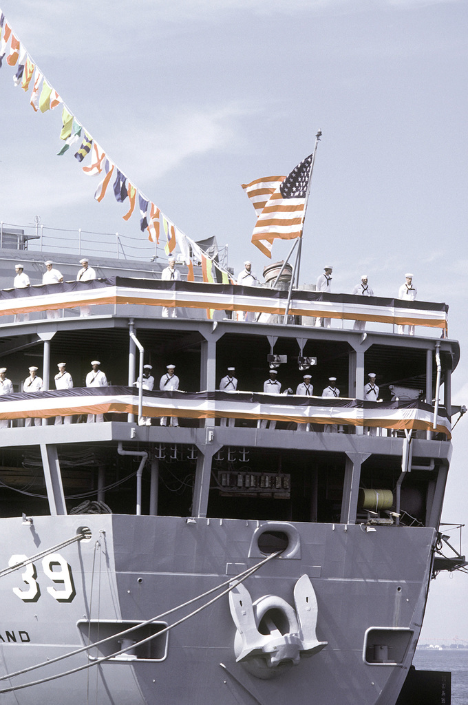 US Navy Engineman 2nd Class Anthony Bartelli (right) holds an