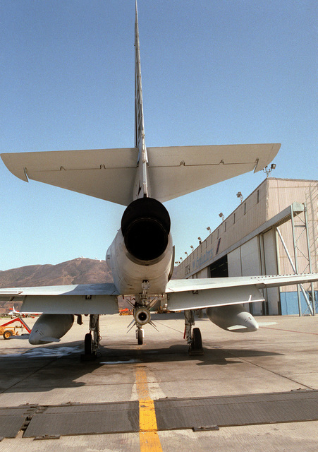 A rear view of an A-4 Skyhawk aircraft with a Harpoon missile fitted ...