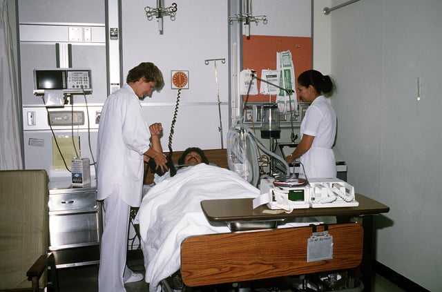 Bird Angermuller A Registered Nurse Checks The Blood Pressure Of