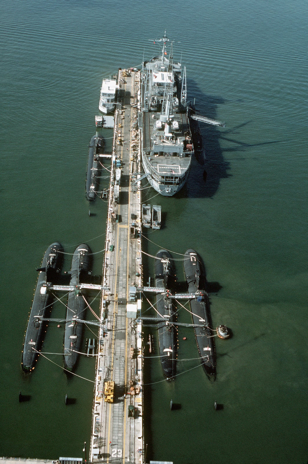 Aerial view of the submarine tender USS EMORY S. LAND (AS-39) at the ...