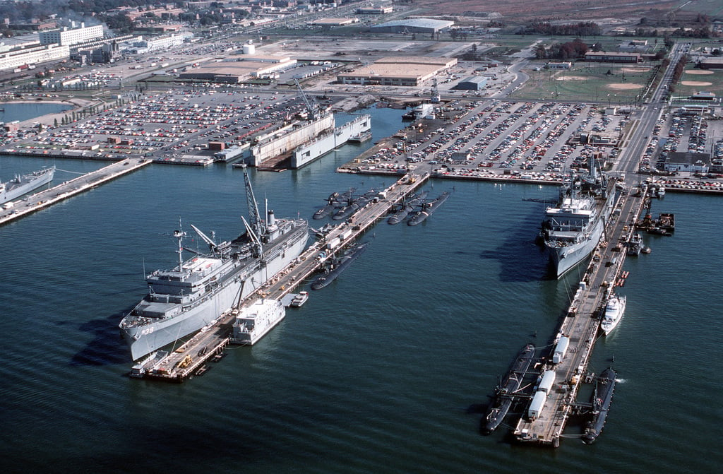 Aerial view of the submarine tenders USS EMORY S. LAND (AS-39) and USS ...