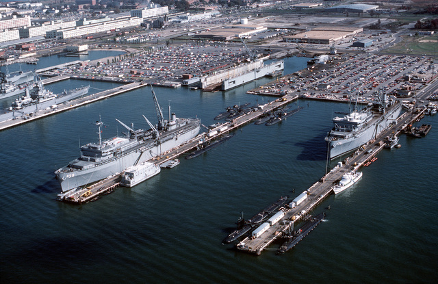 Aerial view of the submarine tenders USS EMORY S. LAND (AS-39) and USS ...