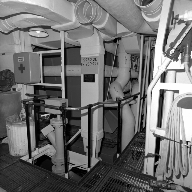 The upper level engine room aboard the guided missile frigates DOYLE ...