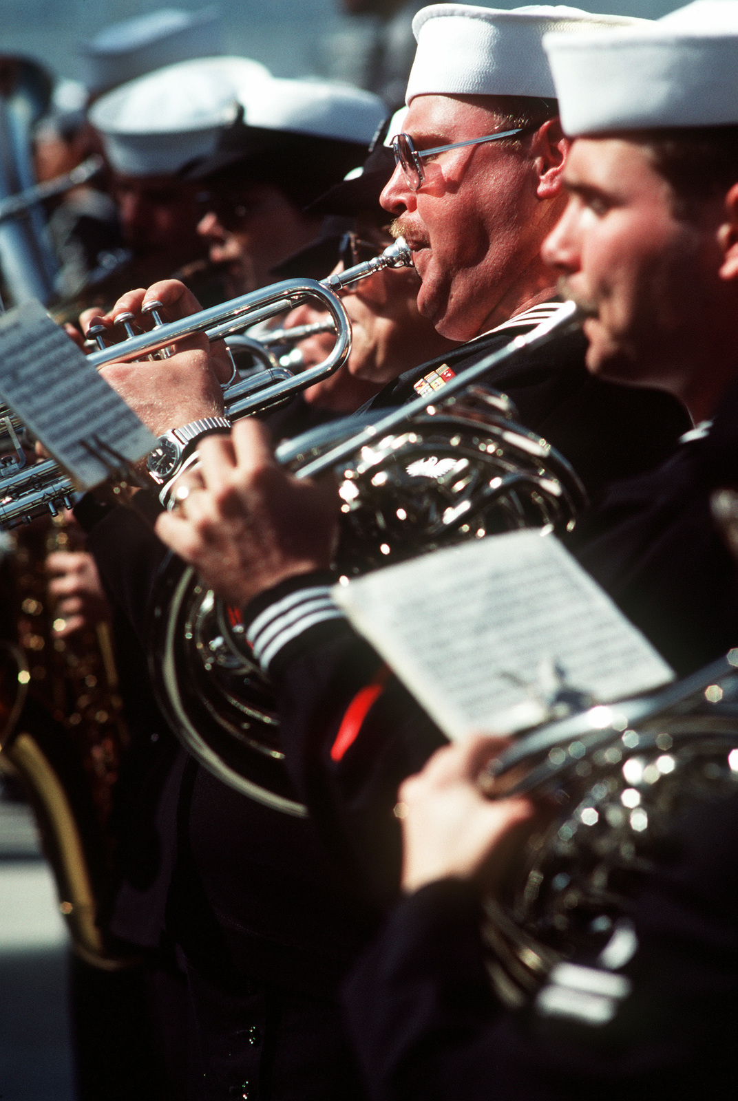 A view of a Navy band as they perform the national anthem during ...