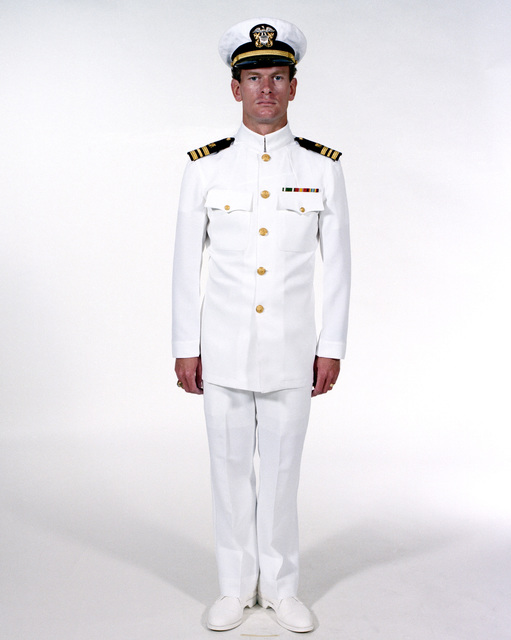 WASHINGTON (Sept. 19, 2007) - A Sailor shows off the prototype uniform for  service dress khaki, a throwback to the traditional WWII style uniform. It  allows for chiefs and officers to shift