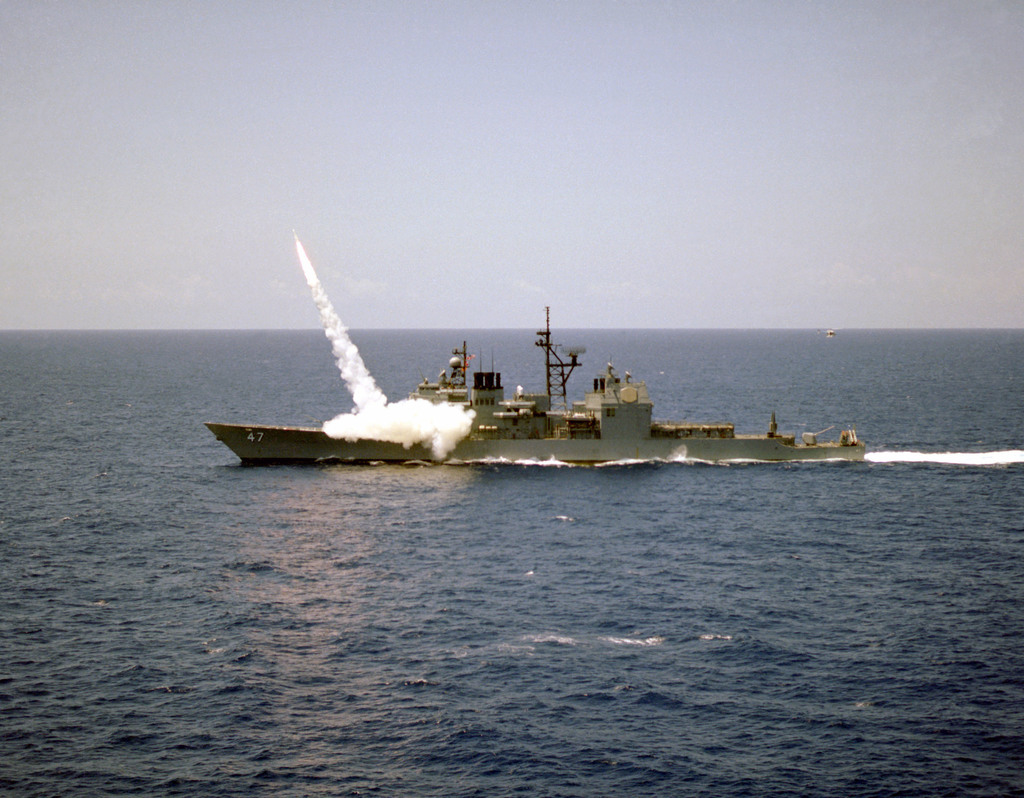 A Standard II missile is launched from the Aegis guided missile cruiser ...